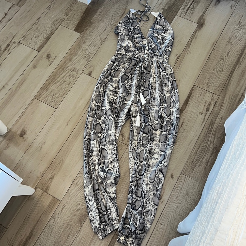 Backless halter snake print jumpsuit!